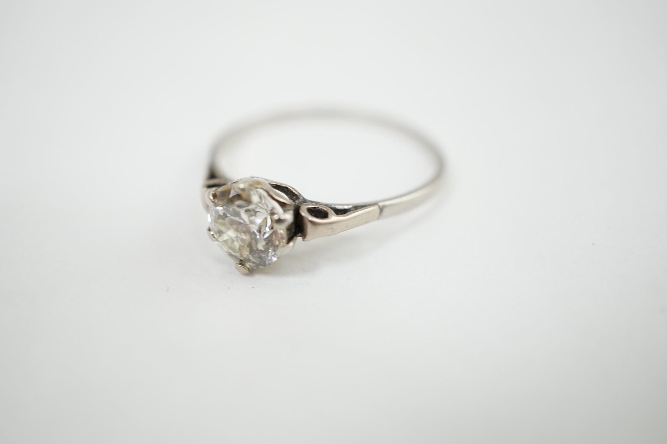 A platinum? and solitaire diamond set ring